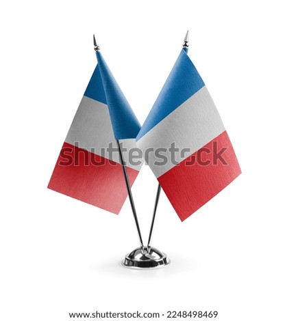 Small national flags of the France on a white background. Royalty-Free Stock Photo #2248498469