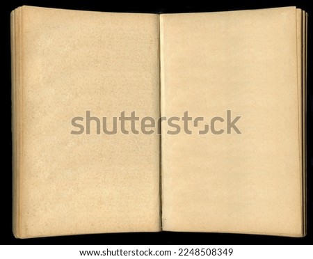 Open old book on black background. Top view. High resolution photo. Full depth of field.