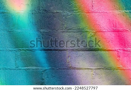 Art under ground. Beautiful street art graffiti background. The wall is decorated with abstract drawings house paint. Modern style urban culture of street youth. Abstract picture on wall