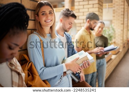University, lobby and portrait of woman and students standing in row together with books at business school. Friends, education and future, girl from USA in study group on campus in corridor for exam