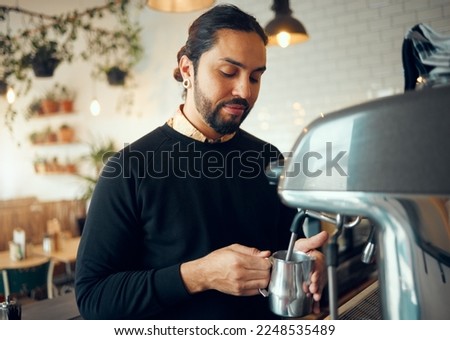 Small business, cafe barista and man working on morning espresso machine in a restaurant. Waiter, milk foam and breakfast latte of a worker from Brazil busy with drink order service as store manager Royalty-Free Stock Photo #2248535489