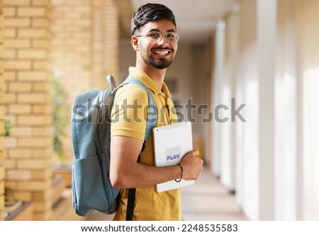 College student portrait, happy man and walking at university with a tablet and backpack to study and learn. Gen z male happy about education, learning and future after studying at school building