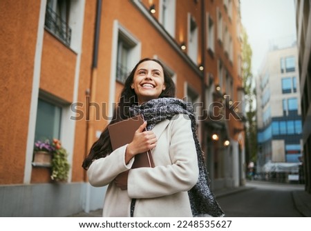 Travel, tourist and book with a sightseeing woman in the city traveling for tourism or vacation. Thinking, journal and traveling with a young female overseas or abroad for holiday in an urban town Royalty-Free Stock Photo #2248535627