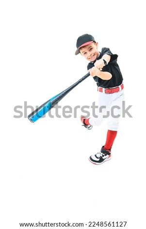 A child baseball player Studio shot over white.