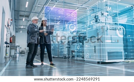 Factory Digitalization: Two Industrial Engineers Use Tablet Computer, AI Big Data Analysis. Visualization of High-Tech Facility into 3D Rendered Neural Network. Industry 4.0 Machinery Manufacturing Royalty-Free Stock Photo #2248569291