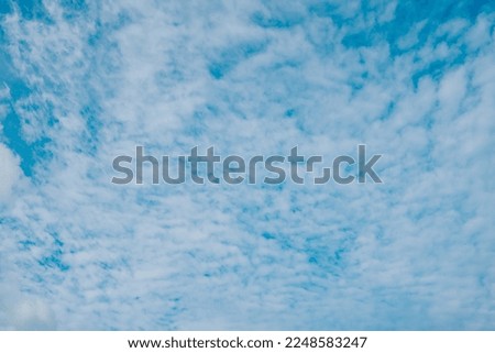 photo of clouds that are very bright and blue in color