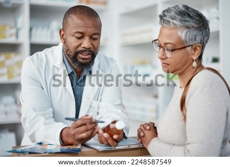 Pharmacy, black man and woman with healthcare medicine and conversation for instructions. Pharmacist, female patient or medical professional talking, stress or explain prescription to senior customer Royalty-Free Stock Photo #2248587549