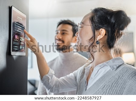Smart home technology, wall system and couple with digital dashboard for air conditioning, safety security network or house automation. App software, ui panel and Asian people programming IOT monitor Royalty-Free Stock Photo #2248587927