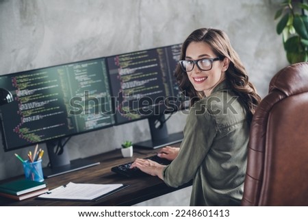 Profile photo of positive clever pc operator lady sit leather chair keyboard write workplace open space indoors