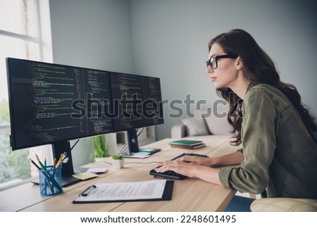Profile side photo of smart focused lady developing site download content install new server reboot operating system indoor workstation