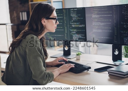 Photo of clever busy lady cyber safety expert wear glasses coding modern device indoors workstation workshop