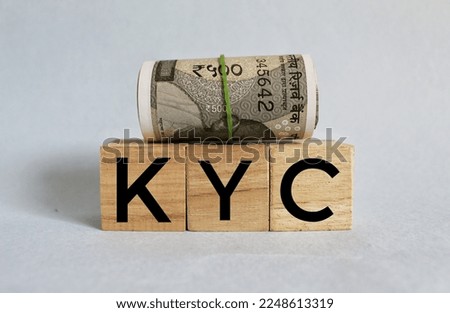 Know Your Customer concept, KYC - letters on wooden cubes. 