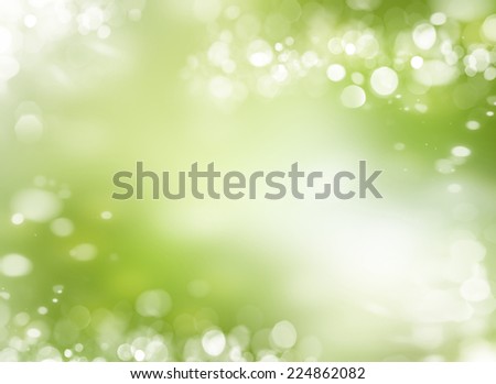 Spring or summer season abstract nature background with grass and blue sky in the back 