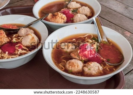 Javanese meatball sauce served in a bowl