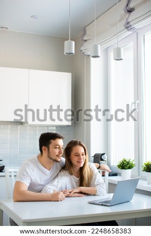 Photo of a couple having online consultation with a family psychologist. Remote work concept. The problem of family relationships. Vertical photo.