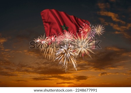 Flag of Morocco and Holiday fireworks in majestic sky of National Independence day Royalty-Free Stock Photo #2248677991