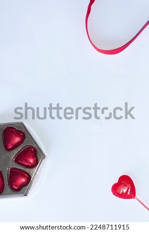 
valentines day background with gifts, hearts and red ribbons decorating
white background with place for text design