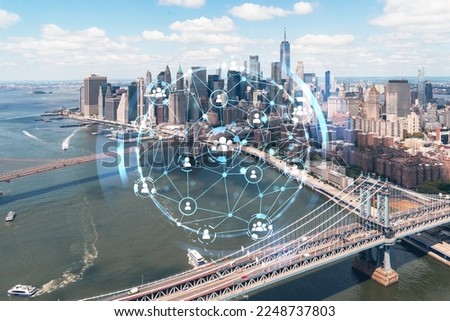 Aerial panoramic city view of Lower Manhattan. Brooklyn and Manhattan bridges over East River, New York, USA. Social media hologram. Concept of networking and establishing new people connections
