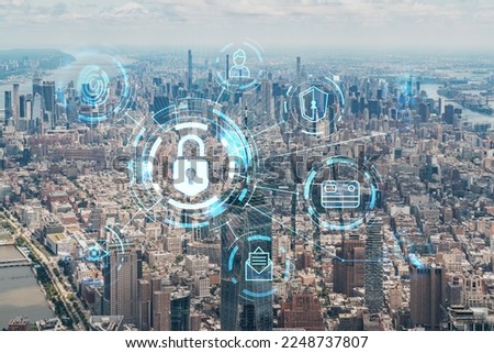 Aerial panoramic helicopter city view of Upper Manhattan, Midtown and Downtown, New York, USA. The concept of cyber security to protect confidential information, padlock hologram