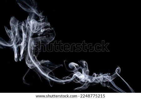 Abstract photo of smoke on a black background.