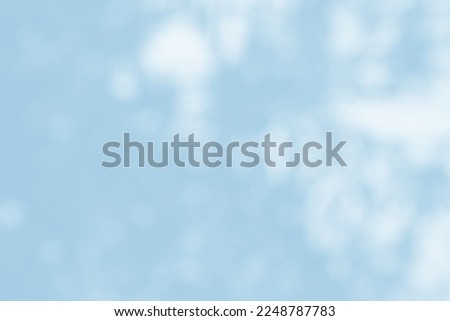 Light blue cloud bokeh as background