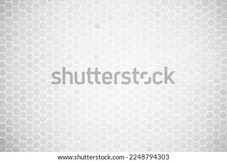 White Hexagon Tile Wall Background with Spotlight at the Center.