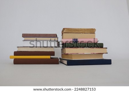 Pile of books on white