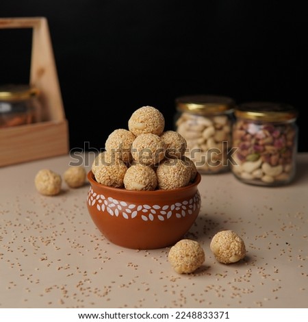 Front View Of Indian Sweet Til Ladoo or Till Laddu In Bowl Royalty-Free Stock Photo #2248833371