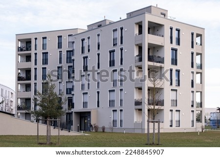 white and grey apartment house in munich aubing Royalty-Free Stock Photo #2248845907