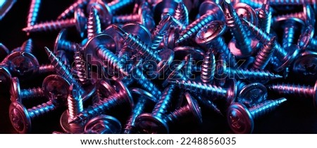 Set of bolts nuts nails metal fasteners. Consumable hardware tools. assortment steel screws collection close up background Royalty-Free Stock Photo #2248856035
