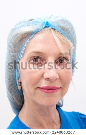 Portrait of smiling mature woman over 50 years undergoing a non-surgical hyaluronic injection procedure, emphasizing the importance of beauty, wellness, and advancements in medical technology