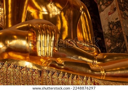 Golden hand, large statue of Buddha's hand close-up photography