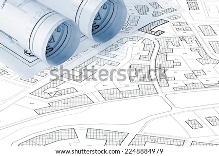 Imaginary cadastral map with buildings, land parcel and vacant plot - land records and property registry concept  Royalty-Free Stock Photo #2248884979