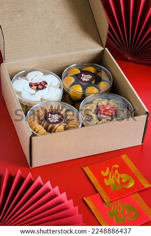 Variety cookies Chinese New Year or kue kering Imlek in box. Chinese character "Fu" means Fortune.  