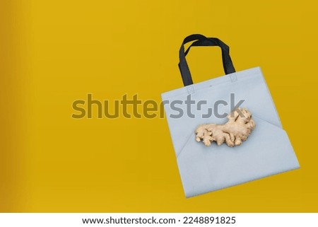 Non Woven Fabric Bag with a yellow background