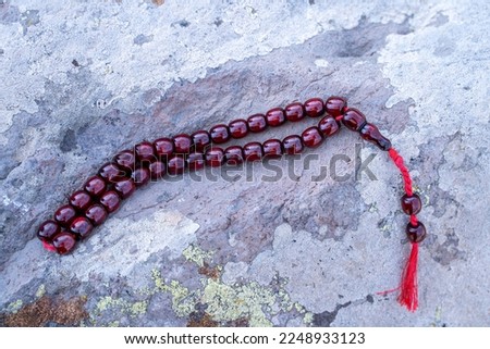 Ottoman-Turkish Amber Rosary , Traditional Islamic cultural representation , On a rock