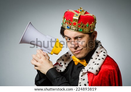 Concept with funny man wearing crown