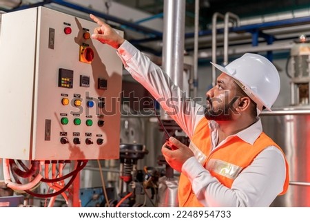 Team of engineers practicing maintenance Taking care and practicing maintenance of machines in the factory so that they can be used continuously.
