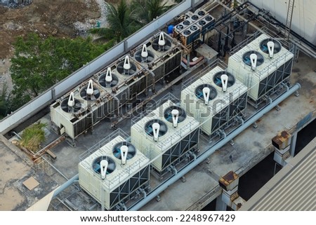 Air conditioner is water cooling tower air chiller HVAC system of large industrial building to control air system  Royalty-Free Stock Photo #2248967429