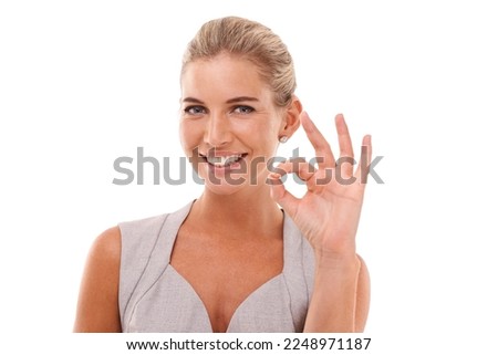 Hand sign, ok and portrait of woman with smile on face, agreement and understanding on white background. Motivation, agreement and good job finger gesture, happy woman in studio with work empowerment
