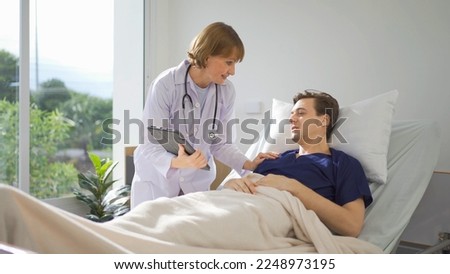 Portrait of caucasian doctor check up body of sick patient on bed in hospital in medical and healthcare treatment at nursing home or clinic. People lifestyle