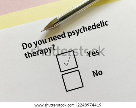 A person is answering question about counseling and therapy. She needs psychedelic therapy. Royalty-Free Stock Photo #2248974419