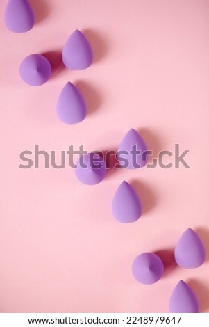 Beauty blender on a pink background.Bright sponges for make-up cosmetics. Makeup products. Beauty concept. Place for text. High quality photo