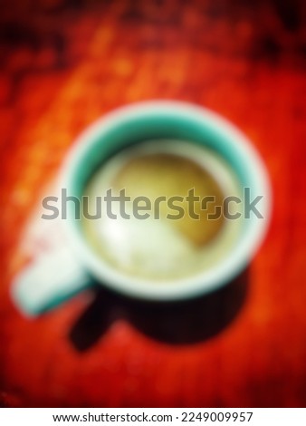 Defocused abstract background of a cup of coffee.