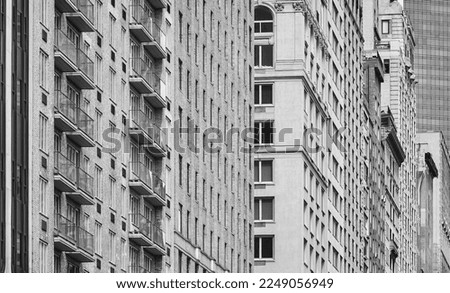 Black and white photo of New York City diverse architecture, USA.