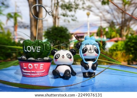 The cuteness of panda bears in the festival of love  Valentine's Day  clear image after blur