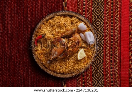 Chicken kabsa - homemade arabian rice, top view
    Royalty-Free Stock Photo #2249138281