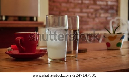Cold drink on coffee table in a coffee cafe