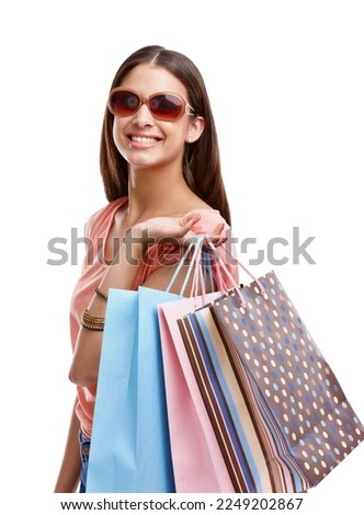 Woman with shopping bag, retail and fashion with shopping and sunglasses isolated on white background. Discount, sale and customer with paper bag, luxury designer brand and clothes with happy woman