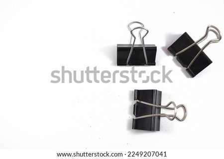 Isolated paperclip on white screen. Used for backgrounds, presentation materials and product elements